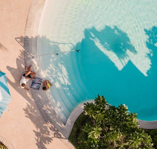 Luxury pool environment with PebbleTec® finish
